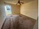 Bedroom featuring a ceiling fan and one window at 1302 Highview Rd, Brandon, FL 33510