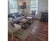 Cozy living room featuring stylish furniture, hardwood floors, and natural lighting at 1321 W North B St, Tampa, FL 33606