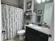 Charming bathroom with shower, granite countertop, and sleek fixtures at 17736 Hickok Belt Loop, Bradenton, FL 34211