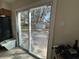 Sliding glass door off dining area allows access to private fenced backyard at 1919 E Noel St, Tampa, FL 33610