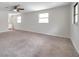 Large main bedroom featuring neutral paint, carpet and a ceiling fan at 2151 E Leewynn Dr, Sarasota, FL 34240