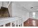 Carpeted staircase leading to the upper level of the house at 2151 E Leewynn Dr, Sarasota, FL 34240