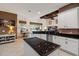 Well-lit kitchen featuring granite counters, stainless appliances, and a breakfast bar area at 21537 Draycott Way, Land O Lakes, FL 34637