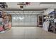 Spacious garage with storage, epoxy floor, and tools at 2359 Emerald Lake Dr, Sun City Center, FL 33573