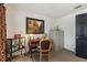 Home office featuring desk, globe, filing cabinet, and decorative accents at 2359 Emerald Lake Dr, Sun City Center, FL 33573