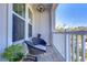 Cozy outdoor balcony with seating and views of the surrounding landscape at 2510 W Cleveland St # 3, Tampa, FL 33609