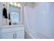 Clean bathroom featuring a tub/shower combo with white subway tile and a stylish vanity at 2510 W Cleveland St # 3, Tampa, FL 33609