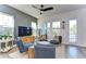 Bright living room with natural light, modern decor, and balcony access at 2510 W Cleveland St # 3, Tampa, FL 33609