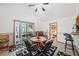 Spacious dining area with sliding glass doors to the patio, seamlessly connected to the interior spaces at 2940 Bay View Dr, Safety Harbor, FL 34695