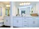 Modern bathroom featuring dual vanities, sleek fixtures, and ample counter space at 3046 Lake Padgett Dr, Land O Lakes, FL 34639