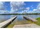 Boat ramp with docks on either side and a 'No Power Loading or Unloading' sign at 3046 Lake Padgett Dr, Land O Lakes, FL 34639