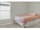 Bedroom with window and bed at 3664 Zephyr Preserve Pl, Zephyrhills, FL 33541