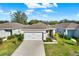 Charming single-story home with a well-maintained lawn and inviting curb appeal at 3664 Zephyr Preserve Pl, Zephyrhills, FL 33541