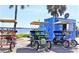 Fun beach rentals await! Multi-person bikes for cruising along the coast at 423 Windrush Bay Dr, Tarpon Springs, FL 34689