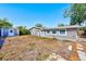 This is the back of the house, showing the detached shed and the large backyard space at 4606 W Oakellar Ave, Tampa, FL 33611