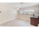 Dining area with recessed lighting, windows, and counter with bar seating at 4606 W Oakellar Ave, Tampa, FL 33611