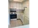 Kitchen featuring appliances and tile flooring at 5895 18Th N St # 11, St Petersburg, FL 33714