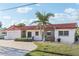 Cozy single-story home with a brick driveway, offering a blend of comfort and curb appeal at 619 59Th Ave, St Pete Beach, FL 33706