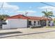 Cozy single-story home with a brick driveway, offering a blend of comfort and curb appeal at 619 59Th Ave, St Pete Beach, FL 33706