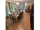 Spacious dining room with hardwood floors and chandelier at 6223 12Th S St, St Petersburg, FL 33705