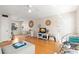 Bright living room with a ceiling fan, seating, and bamboo flooring at 6980 Avenue Des Palais # 2A, South Pasadena, FL 33707