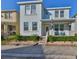 Inviting two-story home with a covered porch, manicured landscaping, and a clean, modern exterior at 7325 S Trask St, Tampa, FL 33616