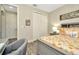 Bedroom featuring neutral paint, wood-look floors, and a closet at 7426 Sungold Meadow Ct, Apollo Beach, FL 33572