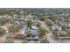 An aerial perspective displays neatly arranged houses complemented by lush trees in a Gathering-friendly neighborhood setting at 9394 117Th Ave, Largo, FL 33773