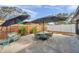 Enjoy the outdoors on this home's back patio with an umbrella covered table and chairs at 9394 117Th Ave, Largo, FL 33773