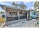 A screened porch is a wonderful place to relax and enjoy the fresh air at 9394 117Th Ave, Largo, FL 33773