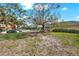 A park with seating area and shaded by mature trees at 11901 4Th N St # 6303, St Petersburg, FL 33716