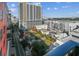 Beautiful balcony view overlooking a curated urban park and vibrant city buildings at 1208 E Kennedy Blvd # 1115, Tampa, FL 33602