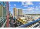 Balcony view of a nearby high rise and cityscape under a bright blue sky at 1208 E Kennedy Blvd # 1115, Tampa, FL 33602