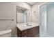 Bathroom features a modern vanity with a dark wood base cabinet and ample counterspace at 1208 E Kennedy Blvd # 1115, Tampa, FL 33602