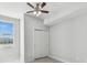 Bright bedroom with a ceiling fan, closet and window with neighborhood views at 1208 E Kennedy Blvd # 1115, Tampa, FL 33602