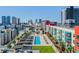 Stunning rooftop pool with city skyline view, surrounded by sleek lounge areas and landscaping at 1208 E Kennedy Blvd # 1115, Tampa, FL 33602