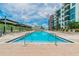 Resort-style rooftop pool surrounded by comfortable lounge chairs and urban views at 1208 E Kennedy Blvd # 1115, Tampa, FL 33602