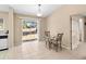 Dining area with sliding glass doors to the backyard at 12112 Feldwood Creek Ln, Riverview, FL 33579