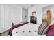 Spacious bedroom featuring a closet, wood floors and an ensuite bathroom at 1545 Emerald Dunes Dr, Sun City Center, FL 33573