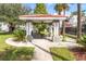 Outdoor gazebo features a picnic table and seating area for relaxing at 18001 Richmond Place Dr # 222, Tampa, FL 33647