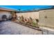 Outdoor patio area with stone flooring, storage shed and lush garden decor at 2492 Laurelwood Dr # E, Clearwater, FL 33763