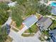 Aerial view of a home featuring mature trees and a well-maintained lawn at 3902 Ixora Ct, Riverview, FL 33578