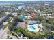 Aerial view of the community with pool, tennis courts, and convenient location at 3902 Ixora Ct, Riverview, FL 33578