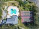 Aerial view of the community pool, sports courts and the clubhouse at 3902 Ixora Ct, Riverview, FL 33578