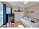 Cozy bedroom with light wood floors and playful dinosaur-themed decor at 3902 Ixora Ct, Riverview, FL 33578