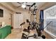 Home gym featuring a variety of exercise equipment and natural light at 3902 Ixora Ct, Riverview, FL 33578