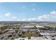 Panoramic aerial view of the city featuring expansive skies, distant buildings, and lush greenery at 4221 W Spruce St # 1414, Tampa, FL 33607