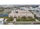 An aerial view of the community shows the immaculate landscaping and nearby city at 4221 W Spruce St # 1414, Tampa, FL 33607