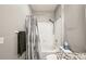 Modern bathroom with a shower-tub combo, gray accents, and a sleek design at 4221 W Spruce St # 1414, Tampa, FL 33607