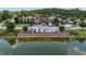 Beautiful community clubhouse with ample parking and a serene water view at 4303 Ortona Ln, Wesley Chapel, FL 33543